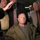 John Demjanjuk leaves a Munich court in May 12, 2011 after being sentenced to five years in prison for charges related to 28,060 counts of accessory to murder